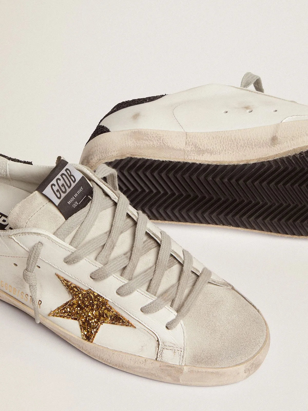 Super-Star sneakers with gold star and glittery black heel tab H484