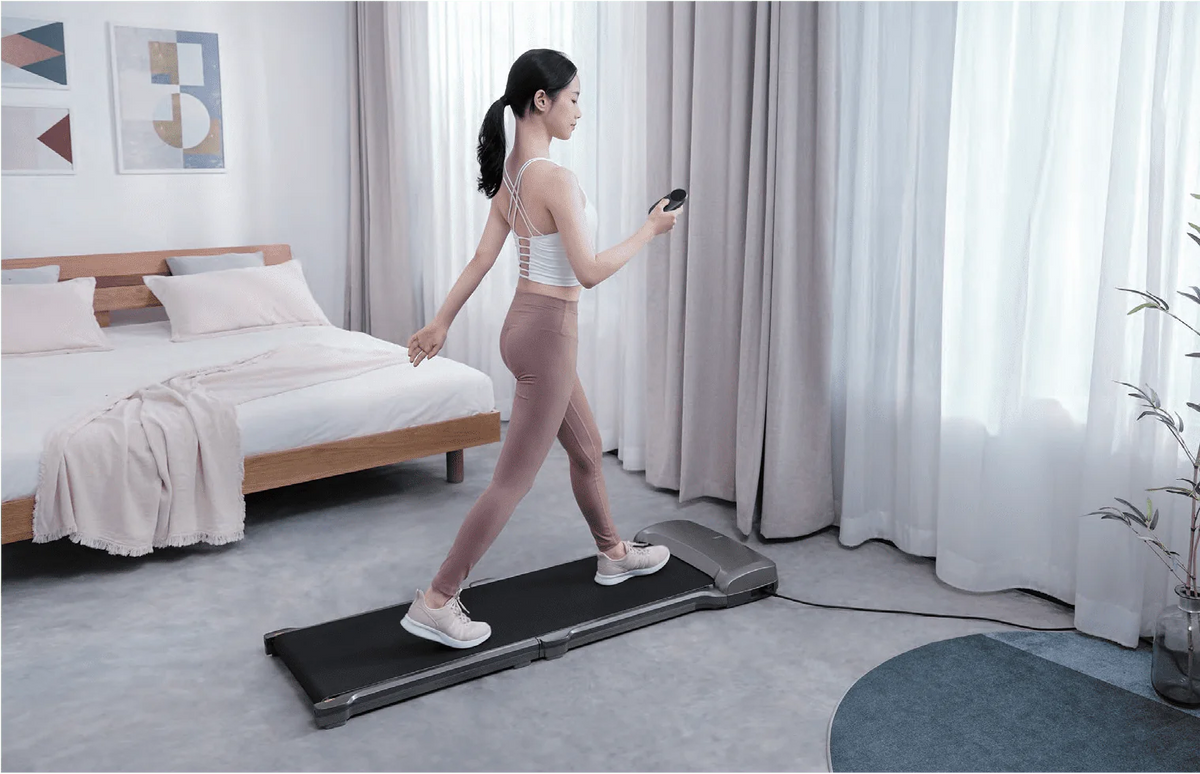 Folding Treadmill with Adaptive Speed Control T4064